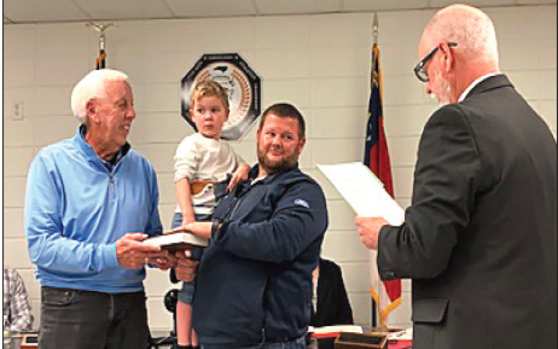 Marcia Barnes • Clay County Progress Clay County Schools Board of Education newest member Josh Ashe was sworn in during the December meeting. In the photo, from left are, Josh’s dad, Ed Ashe, son Hudson Ashe with his father Josh and Clerk of Court Tim Barrett. Josh’s father Ed is a former school board member.