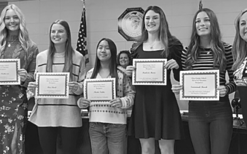 Marcia Barnes • Clay County Progress From left, Ella Matheson, Ava Shook, Phoebe Pietila, Madison Moore and Savannah Burch were presented certificates for outstanding volleyball players by Head Volleyball Coach Tammy Dills at the school board meeting Monday.