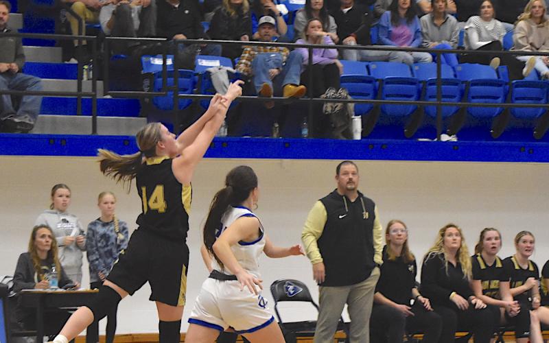 Gary Corsair • Clay County Progress All eyes are on the ball as Hayesville's Briley Clampitt, No. 14, launches a Hail Mary shot as the buzzer sounds at Towns County High School on Friday. The desperate heave didn't go in and the Indians prevailed, 44-42.