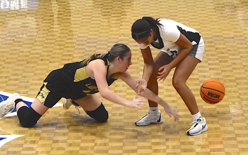 Gary Corsair • Clay County Progress Briley Clampitt dives to the ball in an attempt to regain possession for Hayesville against Coosa.