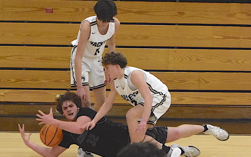 Gary Corsair • Clay County Progress Hayesville’s Kabe Shaheen and Damien Soto attempt to wrestle the ball away from Robbinsville.