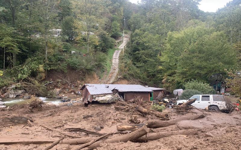 Photo contributed from family fund-raiser page What remains of grandpa Billy Joe and grandma Dora's home in Avery County, N.C. The couple lived there for decades and raised eight children and many other family members felt it was a safe refuge. Fourteen family members sought safety there the day of Helene, but only 12 escaped before the mudslide destroyed the small home.
