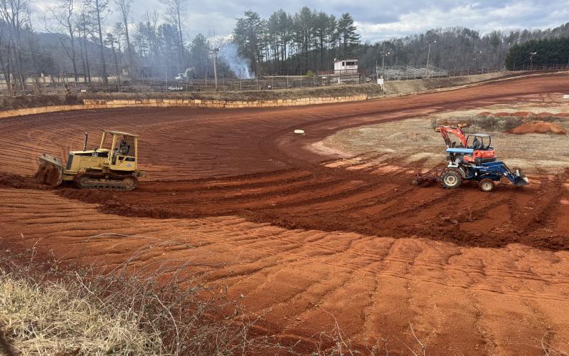 Kristie Oliver/Contributing Photographer A crew of volunteers begins track preparations at Tri-County Racetrack in Brasstown on Jan. 24 ahead of the first scheduled practice session on March 1.