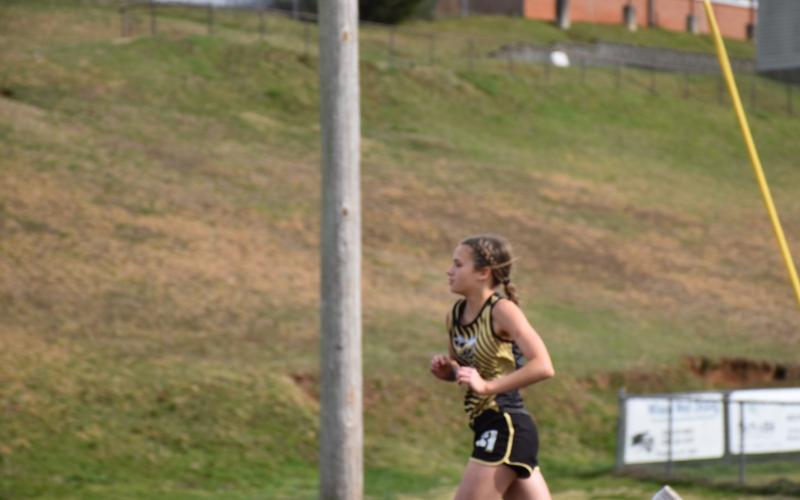 Norashae Patterson • Clay County Progress Makenna Moss helps her team win first in the 4X800 and 4X400 relays.