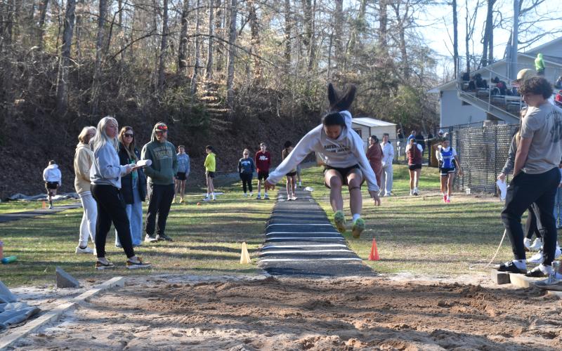 Norashae Patterson • Clay County Progress Lucy Trout jumps into first place with 13 feet 3.50 inches.