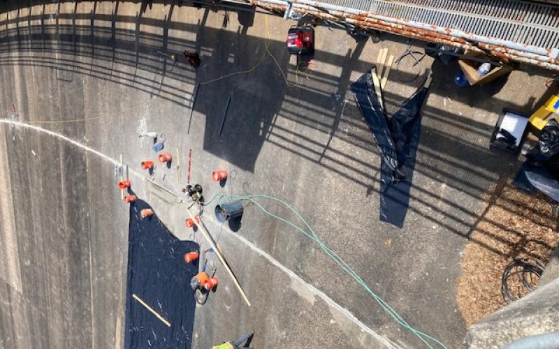 Marcia Barnes • Clay County Progress Work to repair spillway joints at Chatuge Dam were ongoing Friday, March 28 during a TVA media event held at the site.