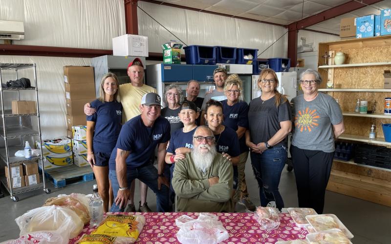 Rock Bottom Recovery and Support volunteers at Matt's Ministry are, front, from left, Daley Tucke; middle, Dee Barnard, Drake Barnard, Carol Barnard, Teresa Burch, Stacie Ledford and Maggie Butler; back, Logan Johnson, Chris Johnson, Rhonda Lents, Roger Lents and Blake Ledford.