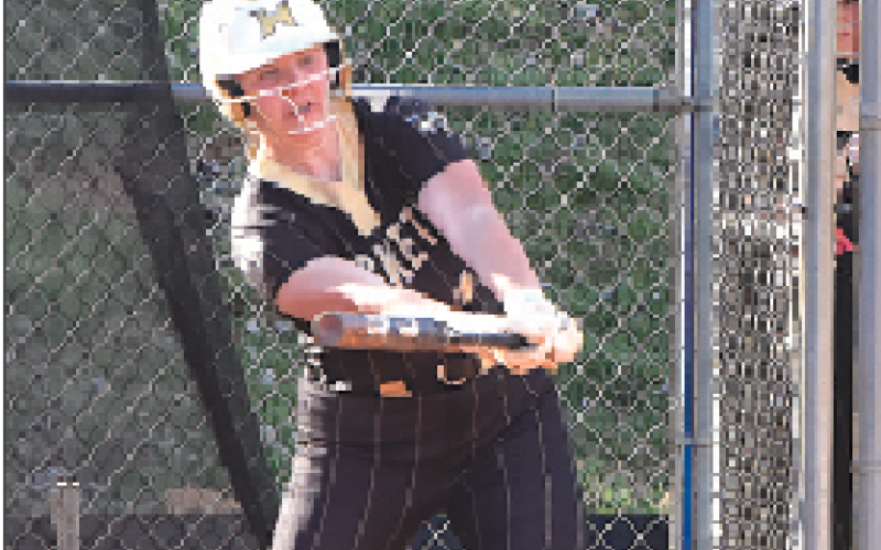 Gary Corsair • Clay County Progress Mallory Peck connects for a single up the middle.