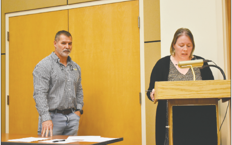 School Board Chairman Jason Shook accompanies Supt. of Schools Melissa Godfrey as she details the schools’ request for local funding during the April 3 county commission meeting.