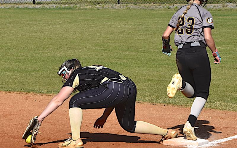Gary Corsair • Clay County Progress Lady Jacket first baseman Danielle Anderson stretches to solve a low throw at first base against Murphy on Tuesday.