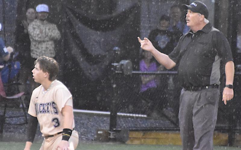 Hayesville's Kyle Shaheen can't believe the call as the umpire declares him out on a stolen base try. The call ended Hayesville’s best opportunity to go ahead against Cherryville.