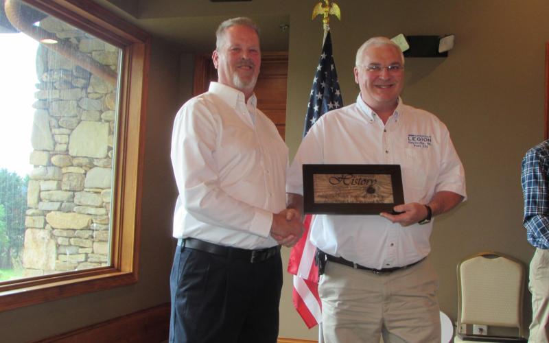 Lorraine Bennett • Clay County Progress Robert Seibert accepting award from Jim Rich for the American Legion Post 532.