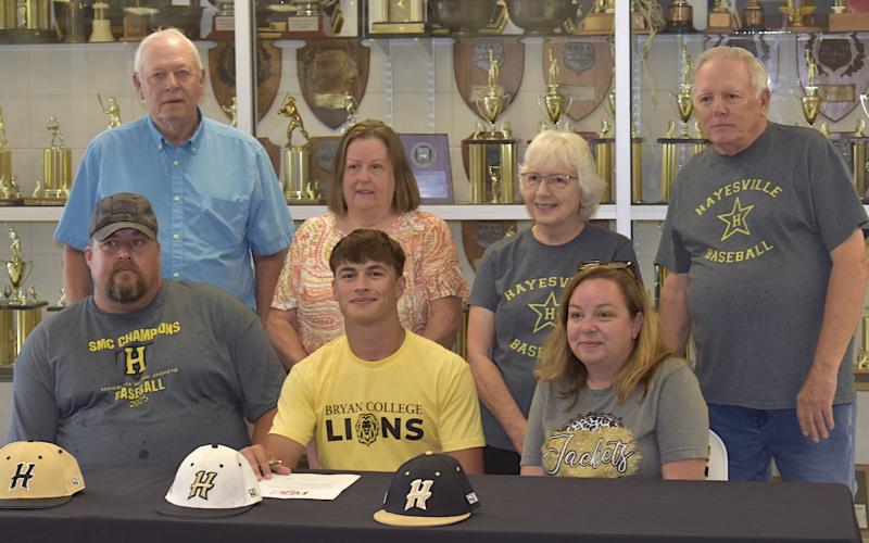 Gary Corsair • Clay County Progress Hayesville standout student/athlete, Tate Roberts, is joined by, front, from left, Jason Roberts, Tate and Anisa Roberts; back, Don Roberts, Melissa Roberts, Betty McKinney and Carroll McKinney as he commits to attend Bryan College, where he will play baseball.