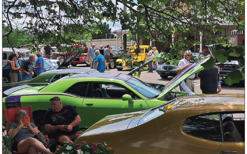 Becky Long • Clay County Progress Autos fi lled three sides of the square on Saturday for the Car-B-Que sponsored by Rotary Club of Lake Chatuge. Next year the event will be held again the fi rst Saturday in June.