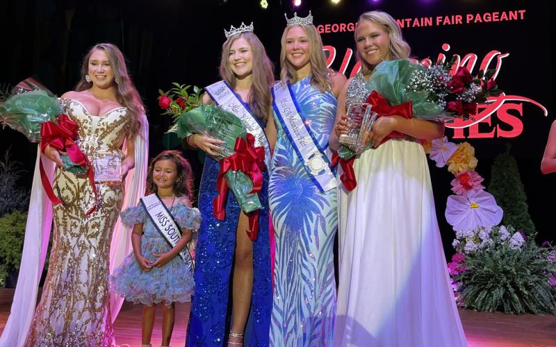 Deby Jo Ferguson • Clay County Progress Georgia Mountain Fair Pageant winners are, from left, first runner up Deanna Crowe, Adeline Turpin, crowned queen Amelia Shook, 2024 queen Rylee Kitchens, second runner up Carlie Barnett.