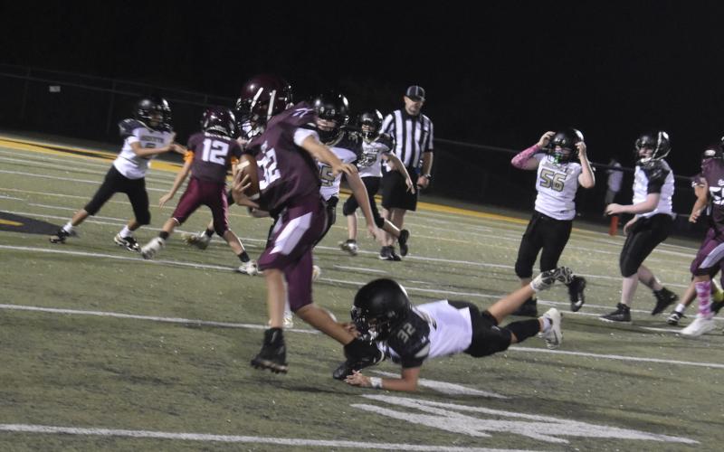 Callie Long • Clay County Progress Levi Cody jumps at the chance to take Swain player No. 32 down.