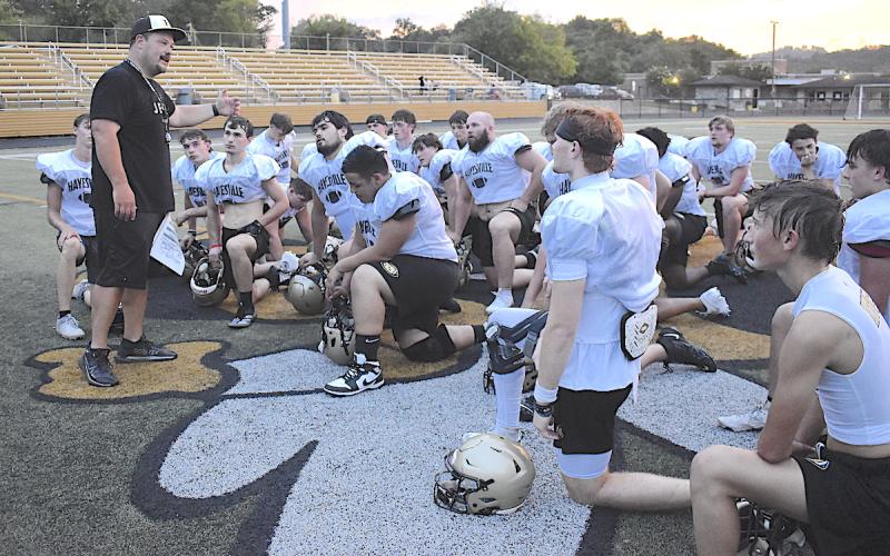 Gary Corsair • Clay County Progress Hayesville head football coach Chad McClure stresses the importance of dedication following Friday's football practice.