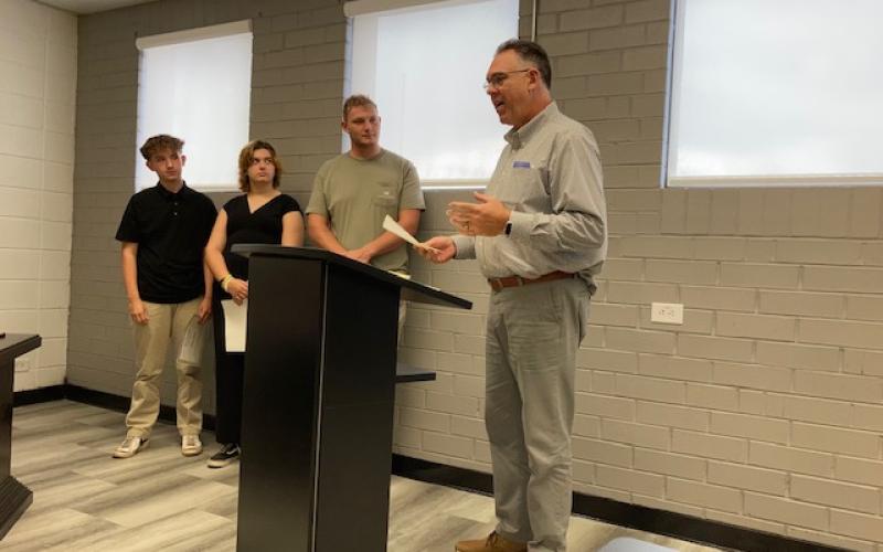 Marcia Barnes • Clay County Progress High School Principal Stacey Overlin, right, presented award certifi cates to, from left, Dalton Hunt, Cailey Bowers and Wyatt James for achievement in their summer experiences.