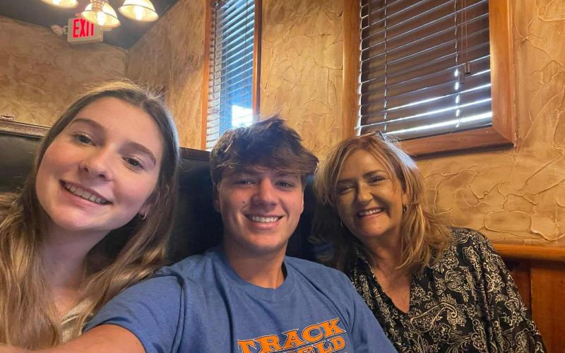 Rock Bottom Recovery and Support Junior Board members from left, Leah Thomas and Landon Trout, stop for some lunch with RBRS founder Stacie Ledford, as the three record data to help make the organization evidence-based.