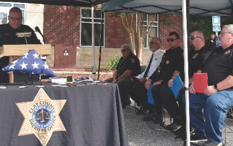 Becky Long • Clay County Progress Speaker Lt. Bruce Moore recognized First Responder representatives from left, Military divisions, Andy Lundquist; Fire and Rescue, Battalion Chief Pete Trocchia; law enforcement, Sean Stout; EMS Community Paramedic, Brandon Bailey; and 911 Director Kevin Sellers.