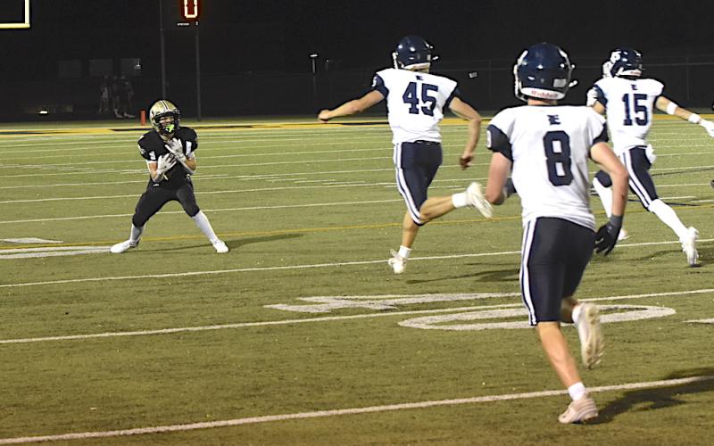 Gary Corsair • Clay County Progress Rylan Graves gathers a third-down pass from Peyton McGaha for a 36-yard gain that caught Enka totally unaware.
