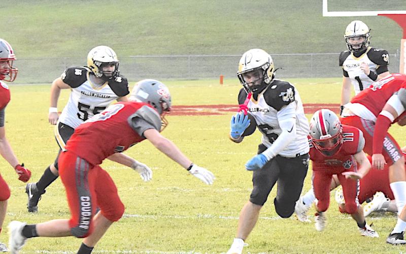 Gary Corsair • Clay County Progress Tre Graves, No. 6, makes Copper Basin defenders miss as he heads for the end zone.