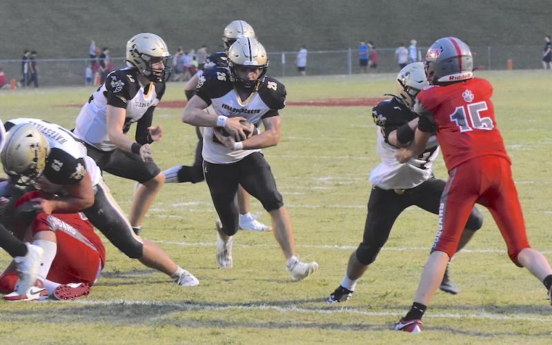 Gary Corsair • Clay County Progress Kaden Ledford, No. 25, finds running room thanks to blocks by Brendon Collins, No. 51 and Eli Jack, No. 7.