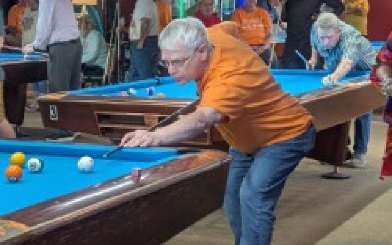 Chris Faries • Photo Brian Kearny shooting billiards.