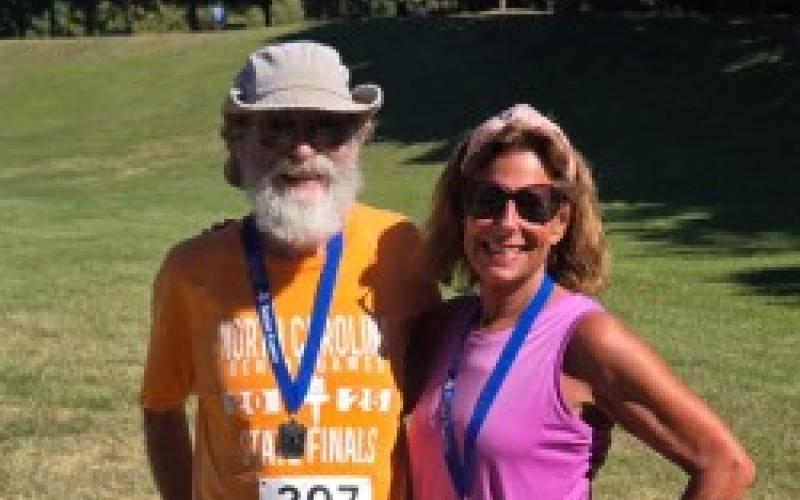Chris Faries • Photo Vann Estes and Michele Preisser both 10k silver medalists.