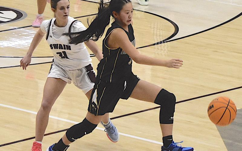 Gary Corsair • Clay County Progress Hayesville’s Lucy Trout, No. 3, out hustles a Maroon Devil for a loose ball.