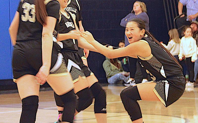 Neal Wachob • Clay County Progress Lucy Trout is helped up by Hayesville teammate Micalynn McClure, No. 10, after Trout collided with a Nantahala Eagle as Ava Moore and Jasmine Brooks, No. 33, come to help.