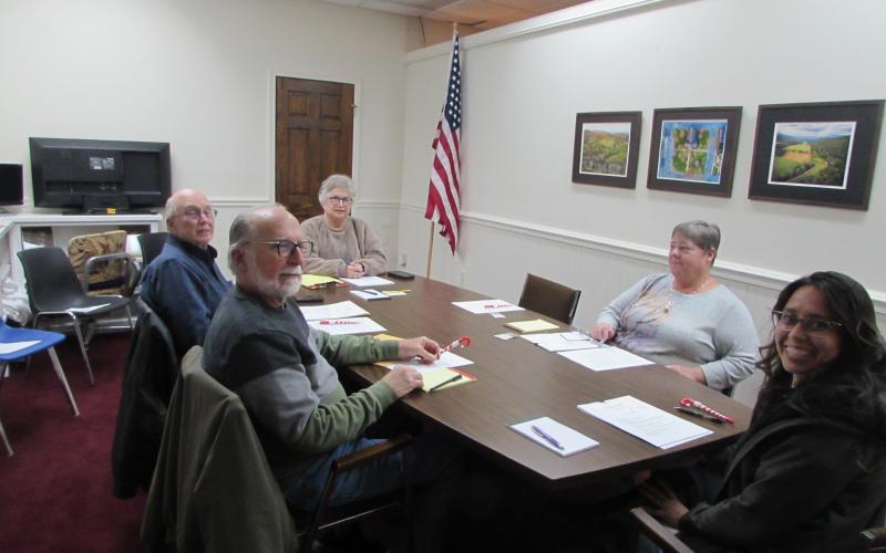 From left, Councilman Joe Staton and Harry Baughn, Town Clerk/Finance Officer Suzanne Hedden, Mayor Benita England and Zoning Administrator April England discuss improvements around town hall.
