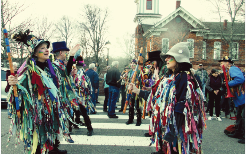 The John C Campbell Folk School Morris Dancers showed their unique skills down Sanderson Street during the Mardi Gras Parade in 2025.