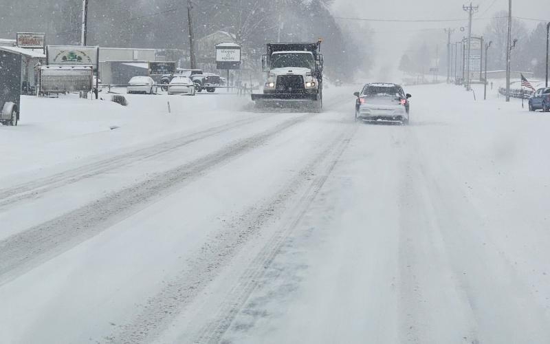 Gracie Taylor • Clay County Progress Clay County DOT truck scrapes Highway 64 west near the Jacky Jones Ford dealership.