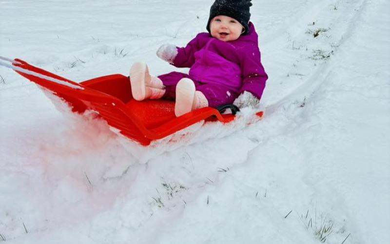 Ayla Canterbury won the Progress Facebook photo contest with 78 likes. Mom Tori captioned the winning photo, “Ayla’s First snow.” Parents Tori and Cody Canterbury won a free e-edition and $25 from our online snow photo contest. “She is the happiest baby who smiles all the time even while sledding,” said her mom.