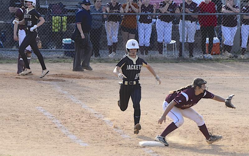 Photo by Gary Corsair Believe it or not, Hayesville’s Micalynn McClure, No. 11, was called out on this hard-hit grounder to second base that ended the game against Swain County.