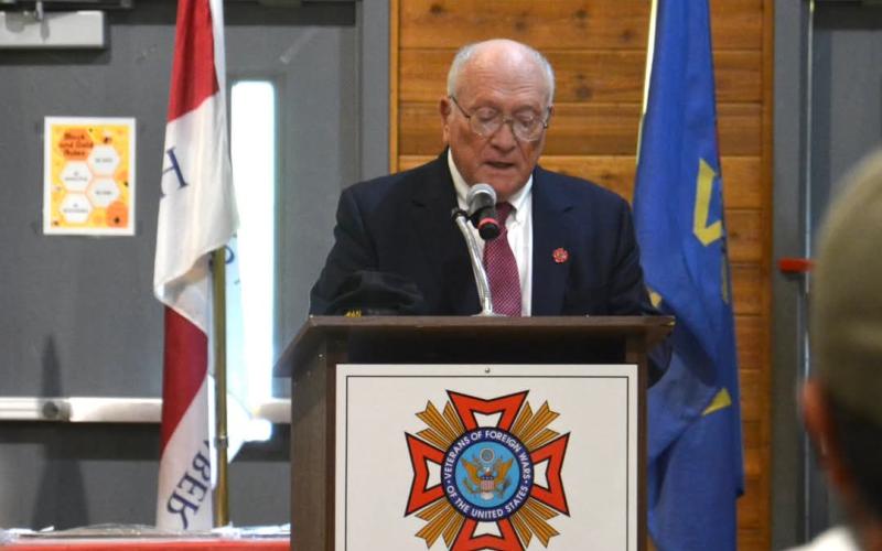 Retired Captain Tommy Jarrett presents the keynote message.