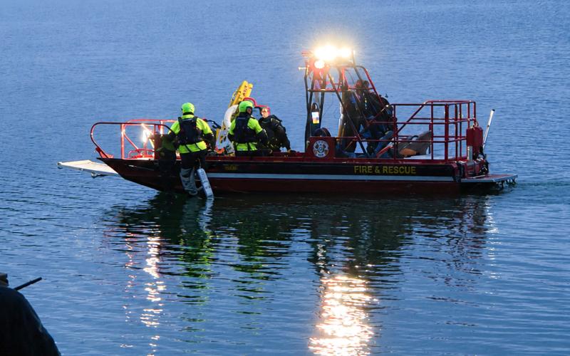 Emergency crews search for the body of Michael Picklesimer Tuesday, June 9.