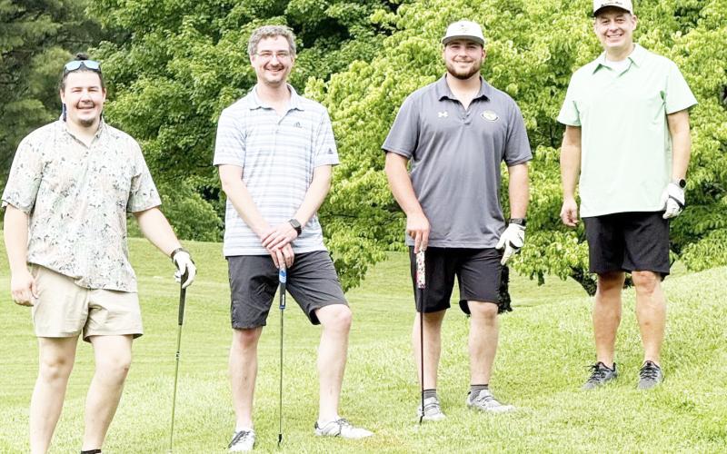From left, organizer Ethan Taylor with his team Will Defee, Richard Defee and Z. Geraty.
