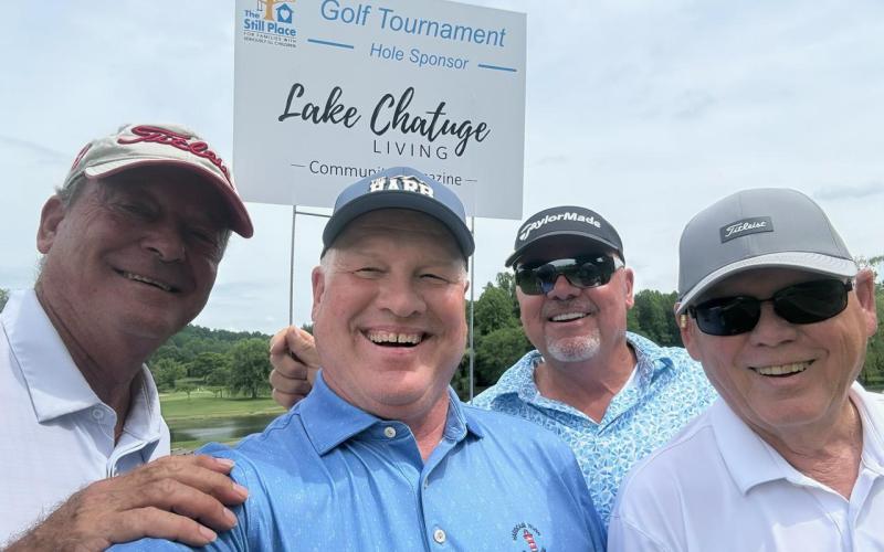 Golf Team members, from left, Lew Smither, Frank Kulbertis, Bob Britton and Alan Link participate in tournament.