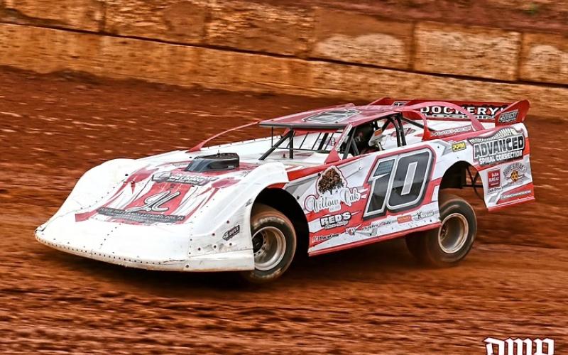 Chance Hughes turns laps in his 602 Late Model. The Hayesville High School graduate qualified third before the rains came.