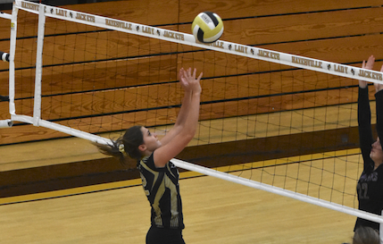 Travis Dockery • Clay County Progress //  Katie Pierce slips a return just over the net in Hayesville’s battle with Union County.
