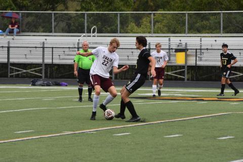 (Progress photo by Travis Dockery) Jared Welch battles for possession against SMC foe Swain.
