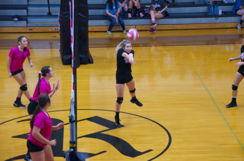 (Kevin Hensley • Graham Star) Emily Byers sends up one of her 10 assists against the Lady Knights.