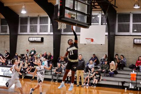 (Kelli Graves  • Clay County Progress) Asher Brown goes up for 2 of his team-leading 26 points against Robbinsville.