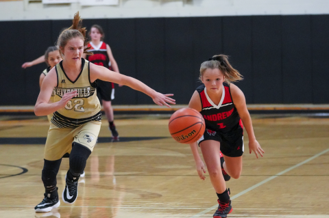(Kelli Graves  • Clay County Progress) Mallory Peck chases down a Lady Wildcat for a steal in Hayesville’s impressive win.