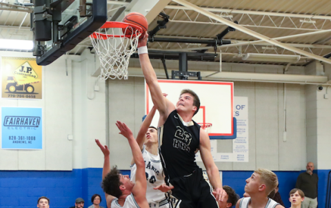 (Kelli Graves • Clay County Progress) Sophomore Jake McTaggart takes flight in The Hawks Nest in Hayesville’s win over Nantahala.