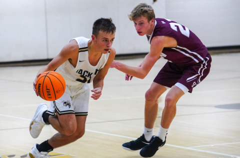(Kelli Graves • Clay County Progress) Eli Roberts uses his speed to break free of a Swain County defender.