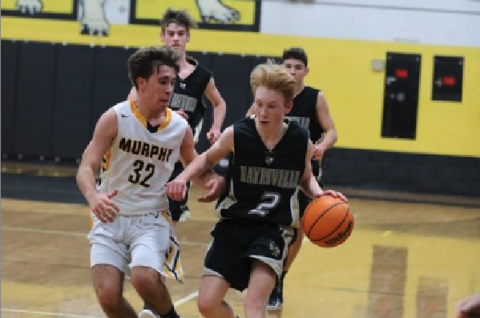 (Kelli Graves * Clay County Progress) Will Englemann tries to evade a Bulldog defender on Thursday.