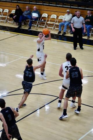 Photo by Kelli Graves / Clay County Progress: Mark Cothren floats in the lane for a jumper against Robbinsville.